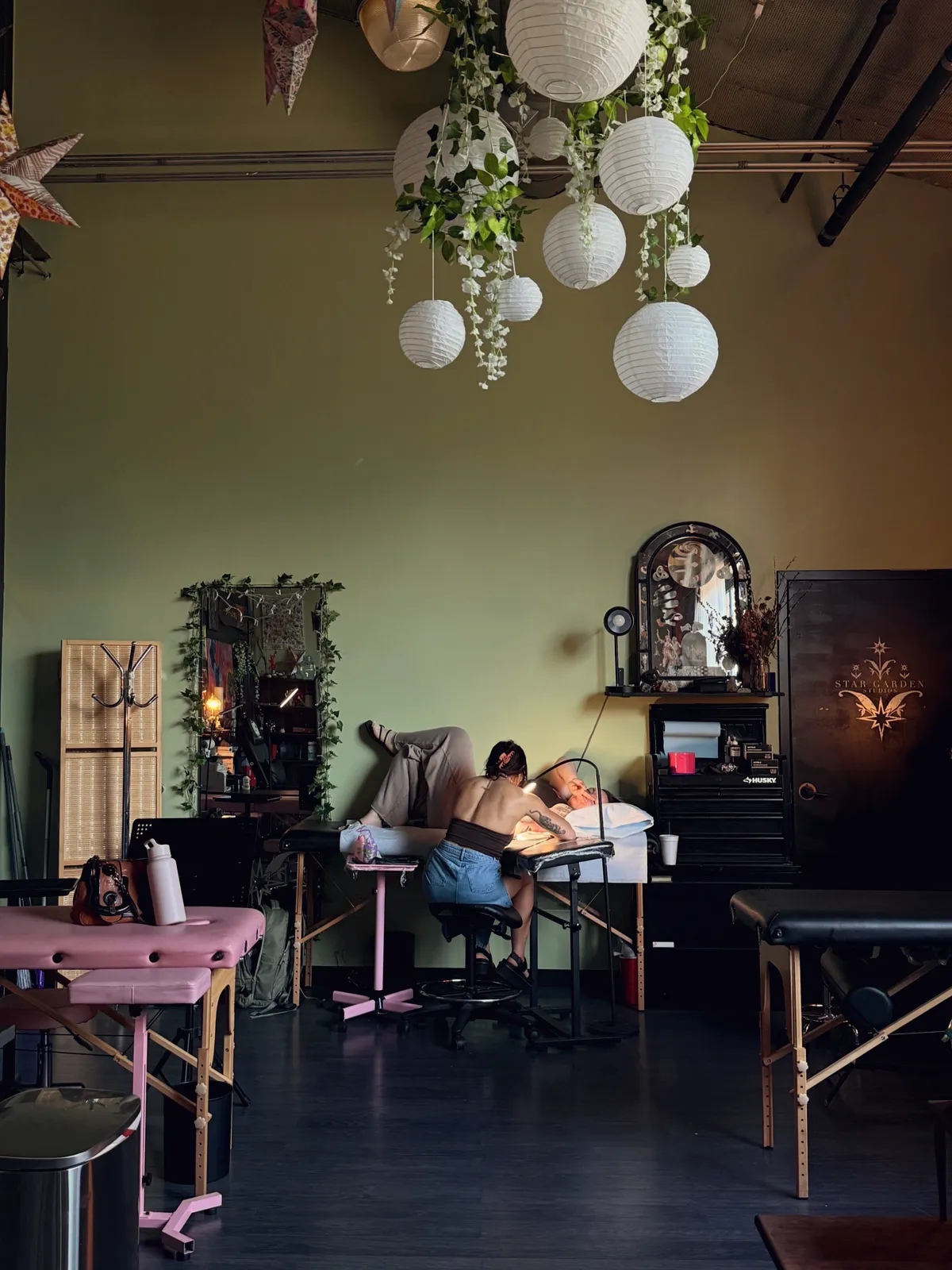 Alyssa Collins tattooing in the studio